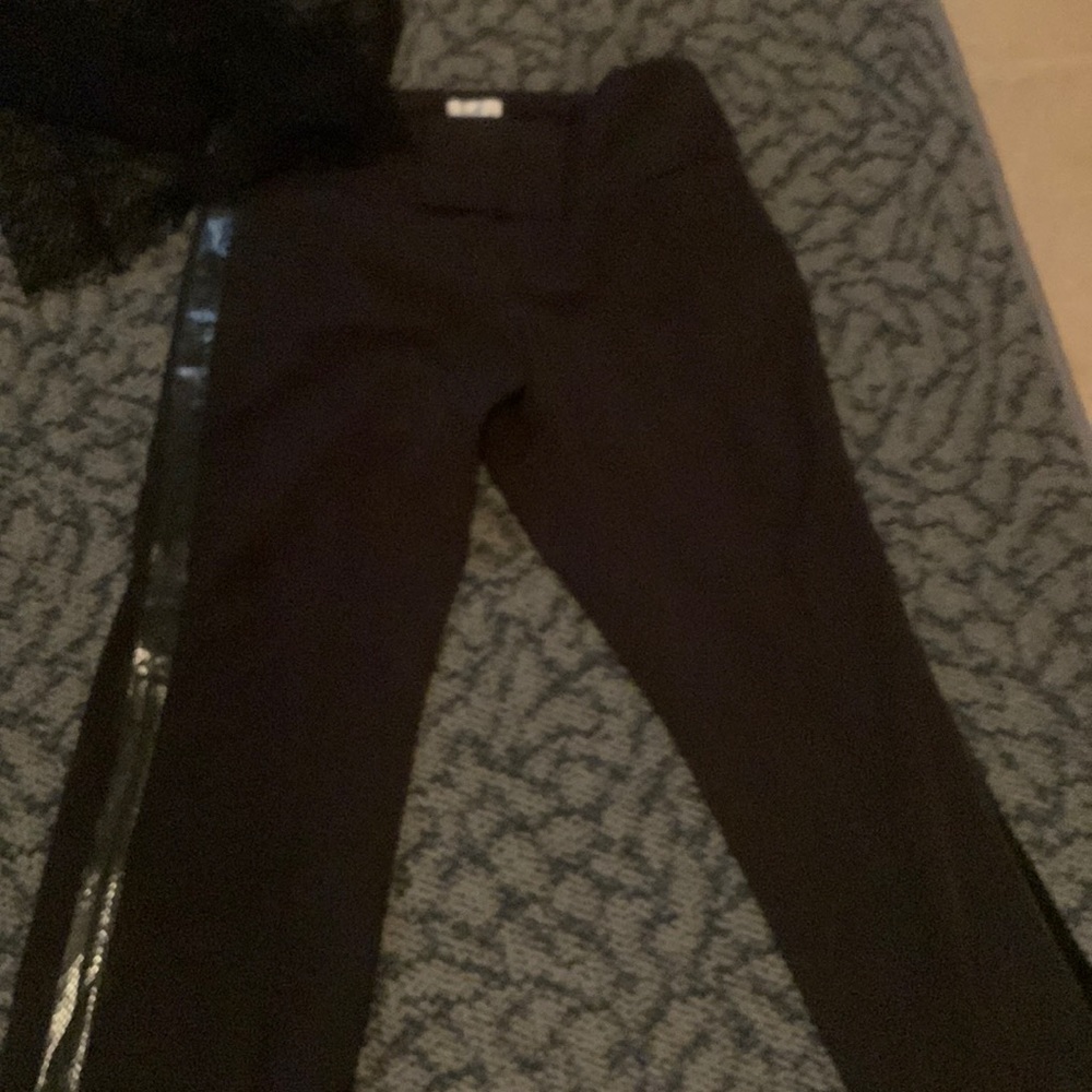 Full trouser trimmed in Faux leather on both sides of the legs